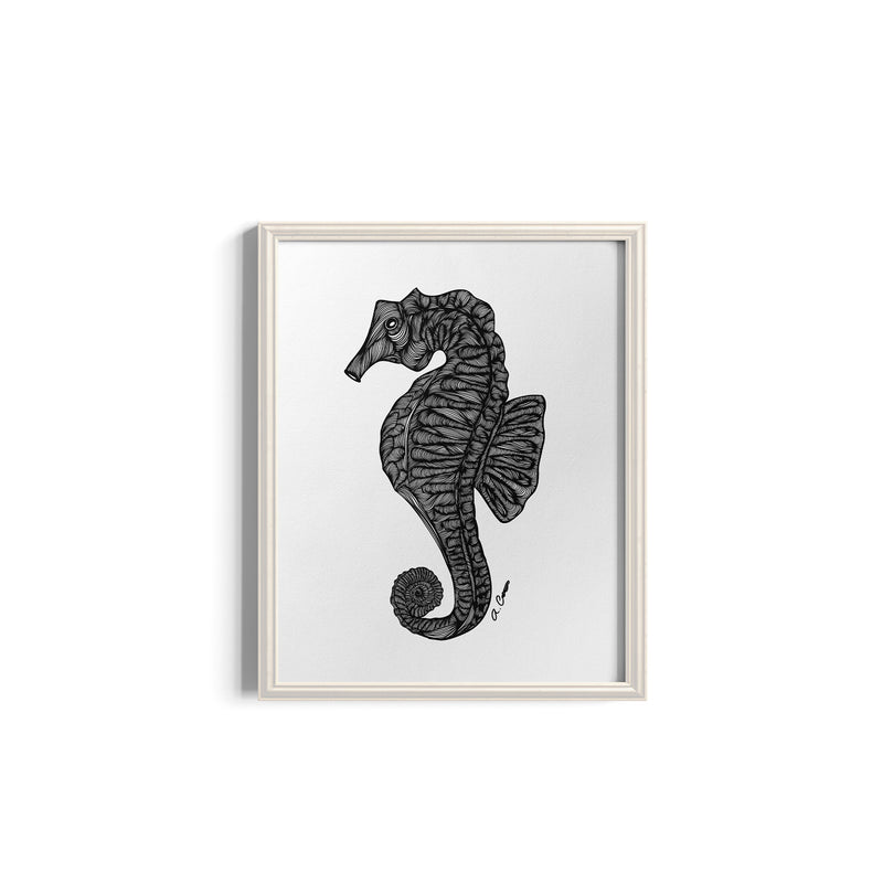 Framed artwork of a black seahorse on a white background
