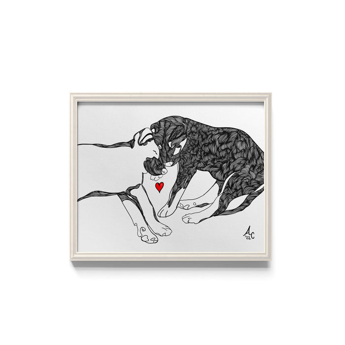 Framed black and white illustration of two puppies sleeping with a red heart.