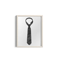 Framed artwork of a black and white striped tie on a white background
